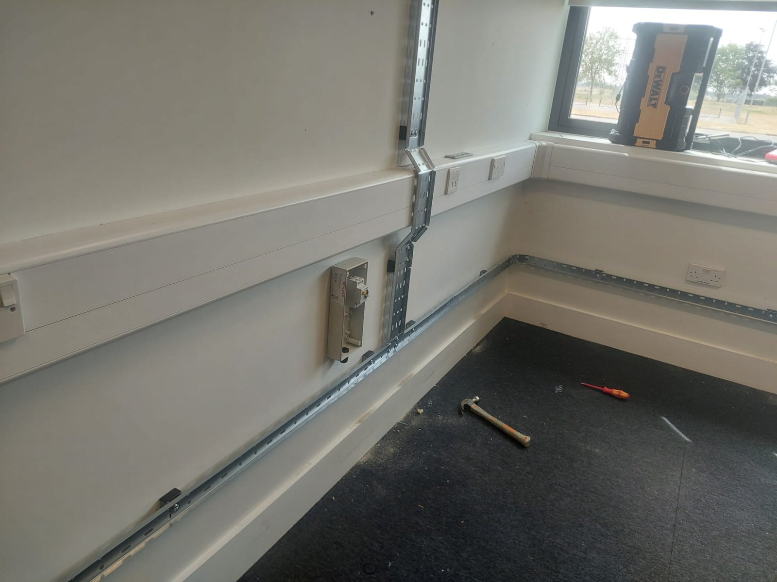 Dado trunking run around the perimeter of an office