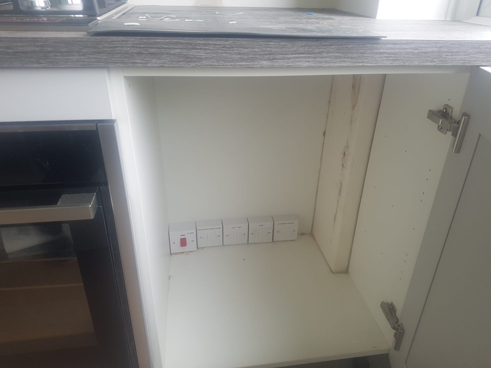 Isolation switches installed discreetly inside a cupboard