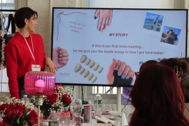 Chloe teaching press on artists at her Boston event