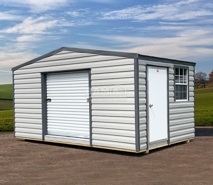 Gray side gable storage shed with roll-up door and windows
