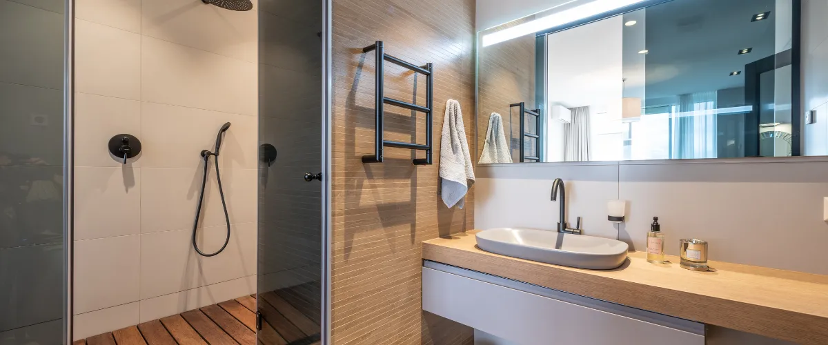 Rustic log cabin bathroom with large soaking tub, wood cabinets, and warm decor