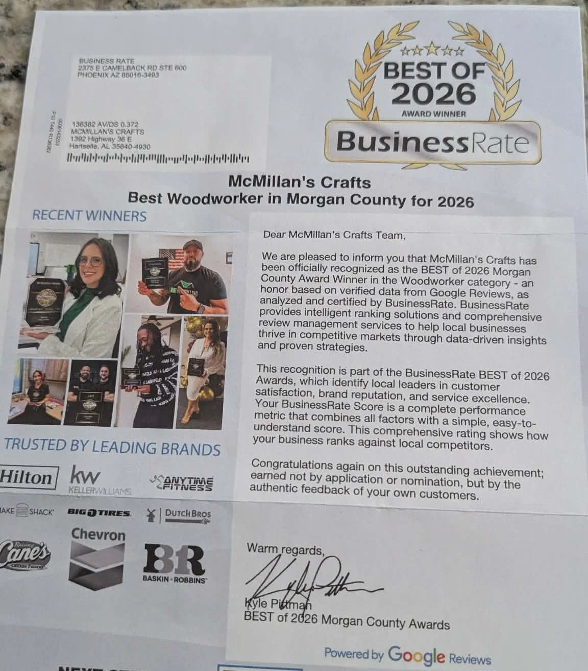 A letter from BusinessRate congratulating McMillan's Crafts as the 'Best of 2026 Morgan County' award winner for woodworkers.