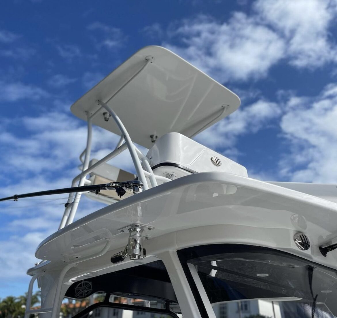 Clean white boat t-top against blue Florida Keys sky