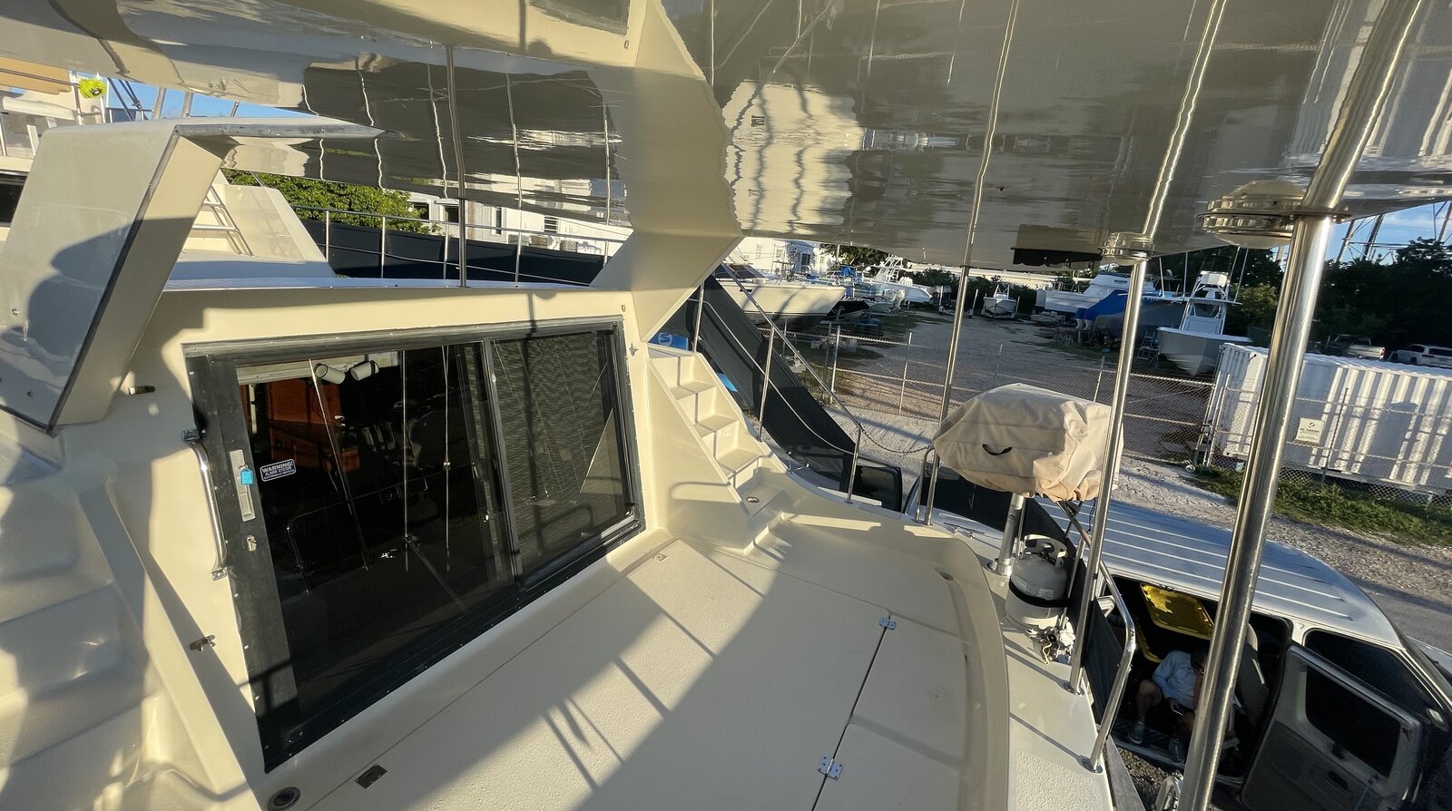 Mirror-finish ceramic coated flybridge on a detailed motor yacht