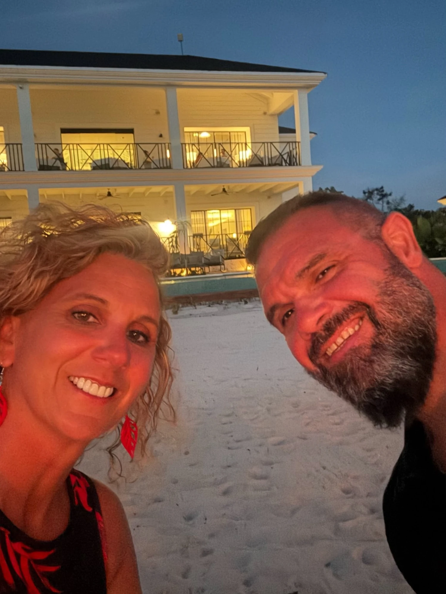 John and Karla Wiser taking a selfie together at dusk