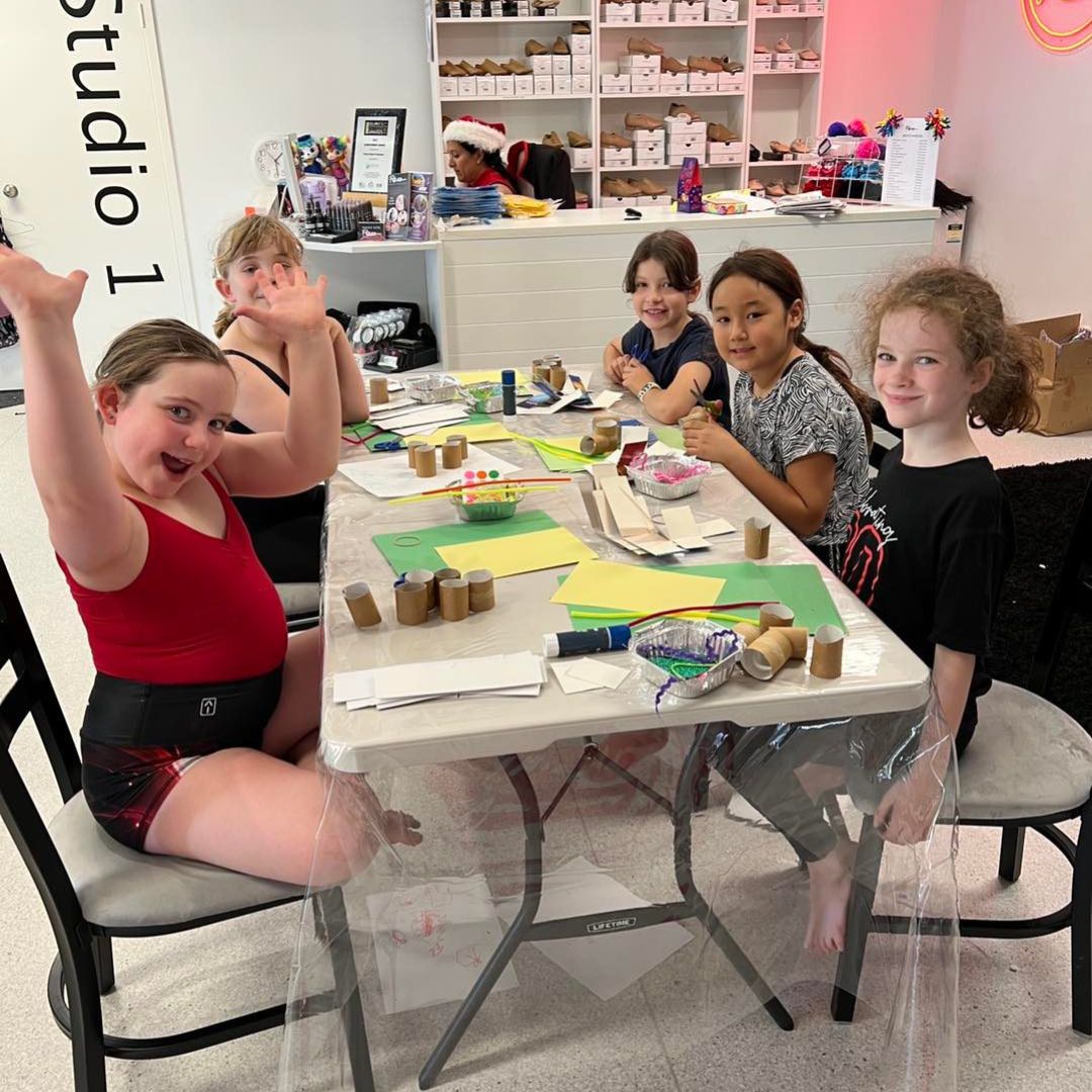 Students participating in a holiday workshop at our Belmont studio. Join us for workshops catering to all age groups. Explore our offerings today!