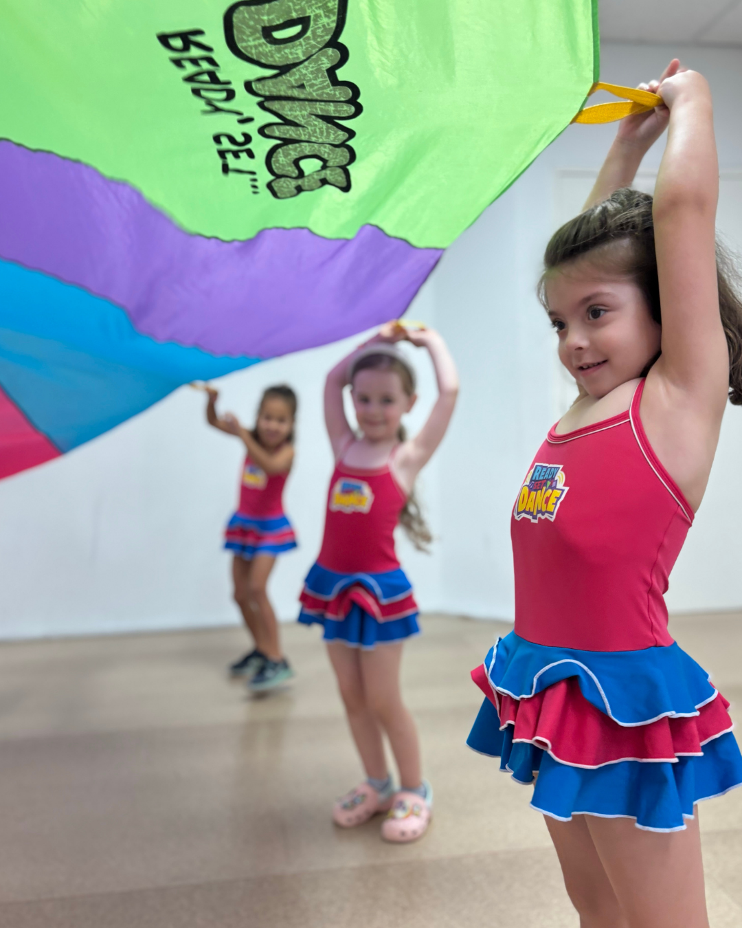 Students engaging in a holiday workshop at our Belmont studio, participating in fun activities. Join us for workshops catering to all age groups and explore our offerings today!