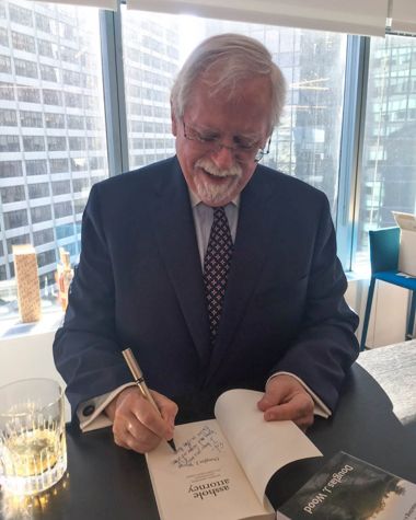 Doug signing his memoir in Manhattan