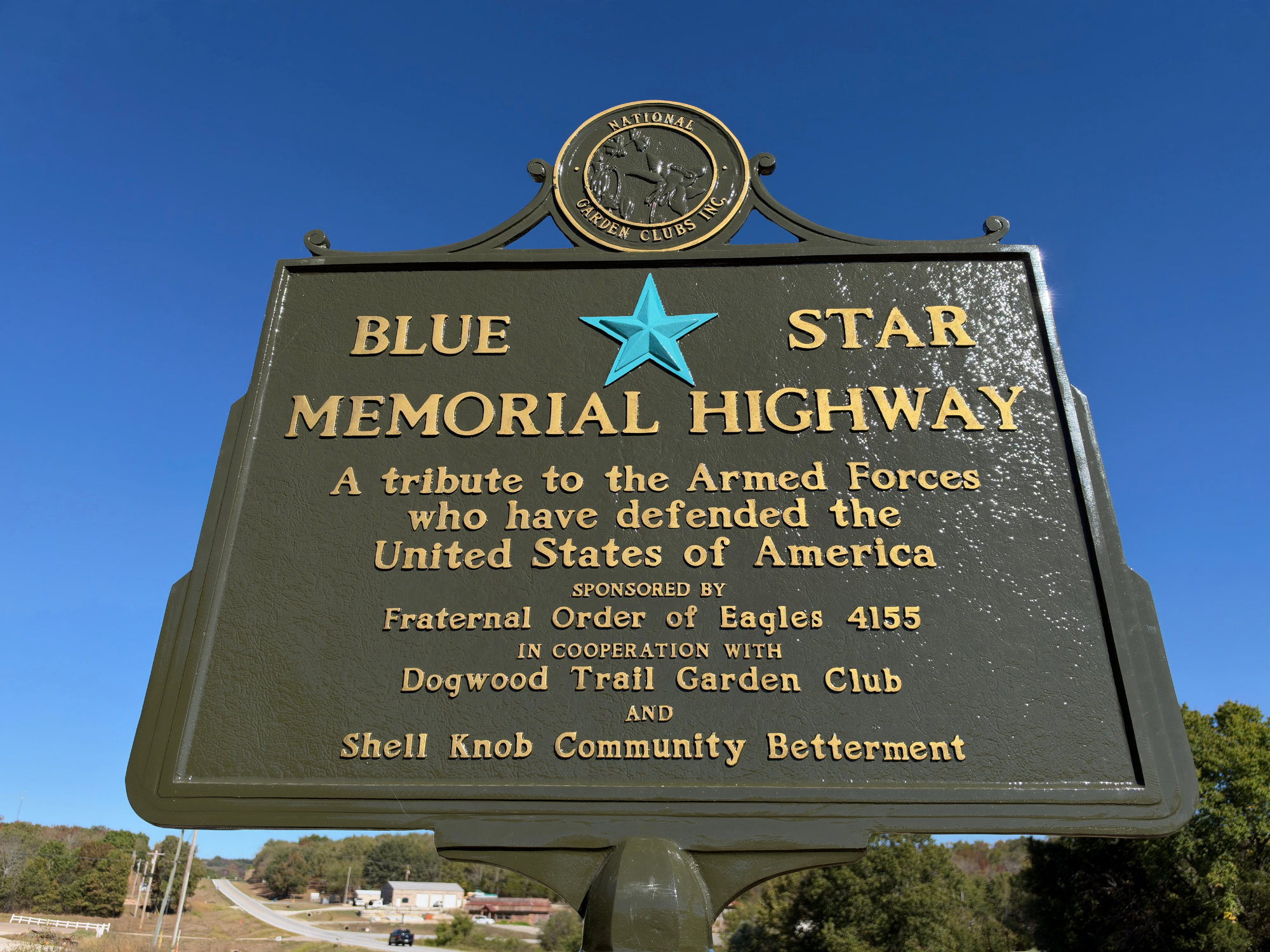 Blue & Gold Star Road Sign