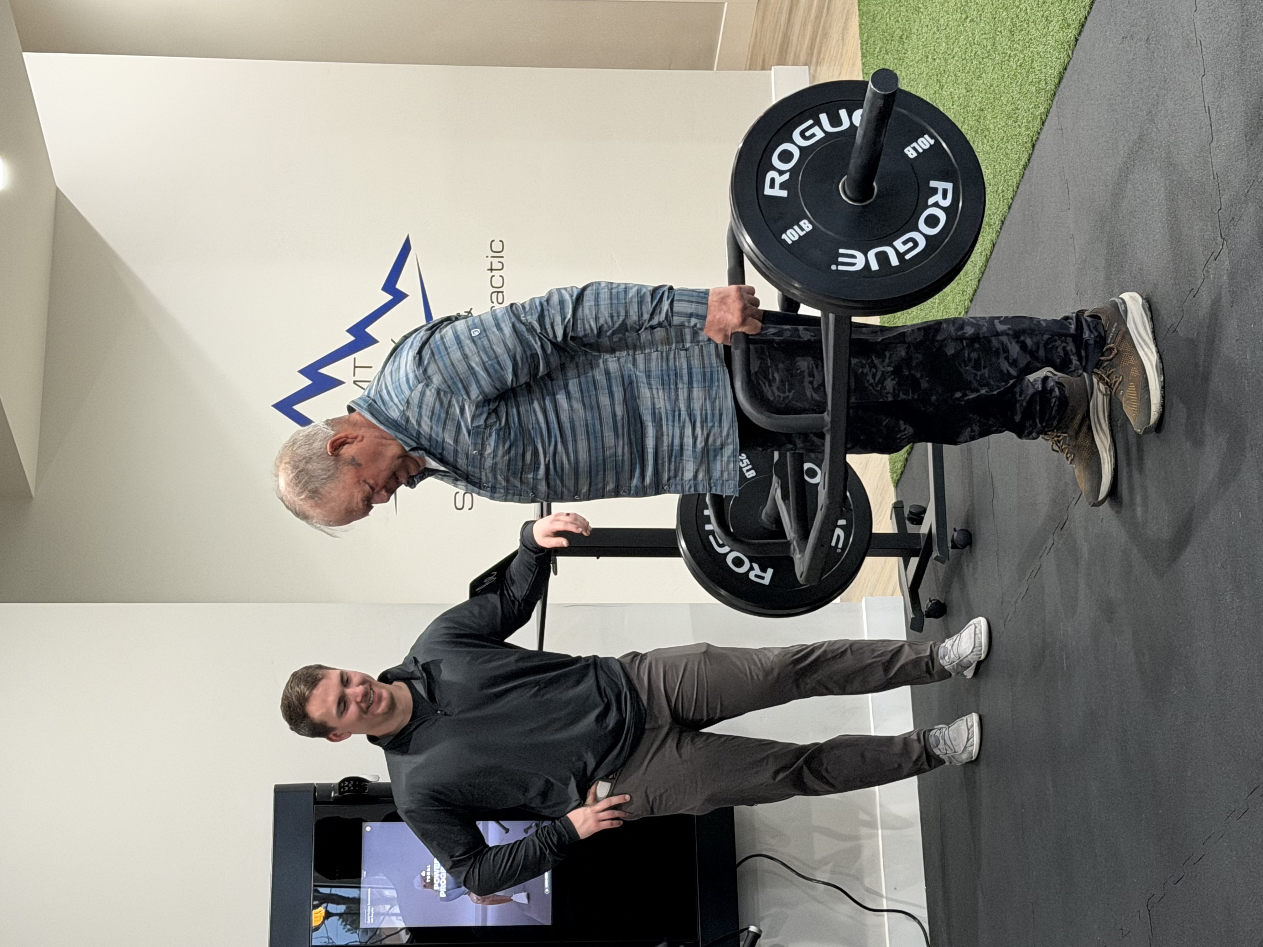 Dr. Mike working with patient Bill at MVMT Rx