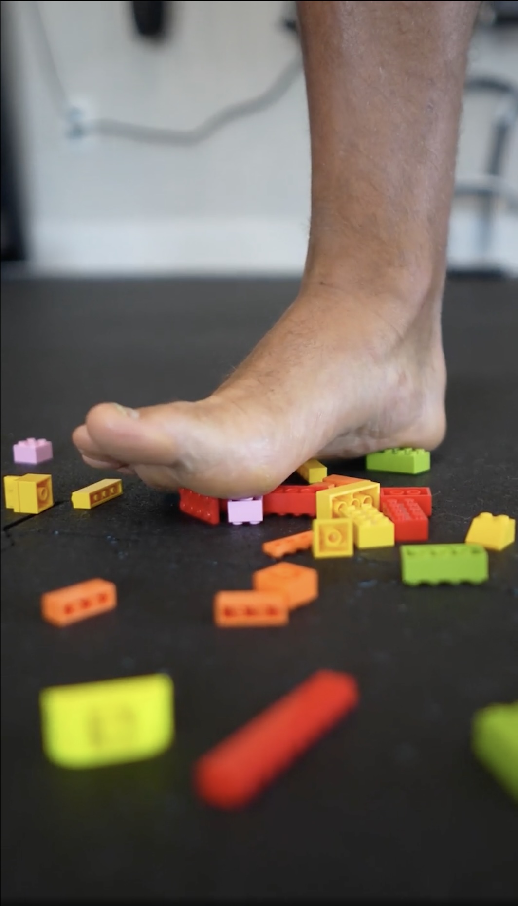 Bare foot stepping on Legos — what plantar fasciitis feels like every morning