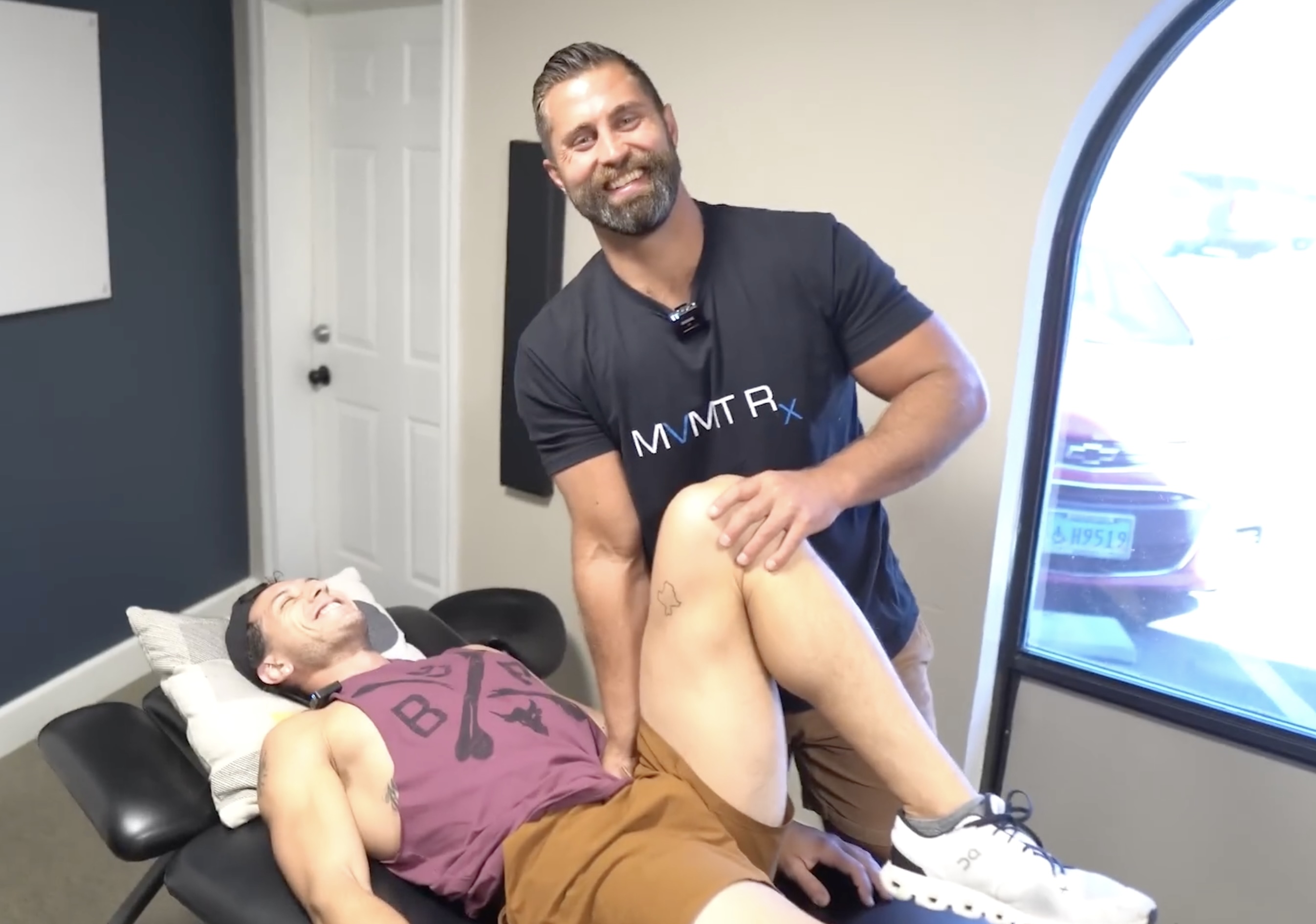 Dr. Kyle Hemsley performing clinical myofascial release on the psoas major for hip pain treatment at MVMT Rx Sports Care and Chiropractic in Sparks NV
