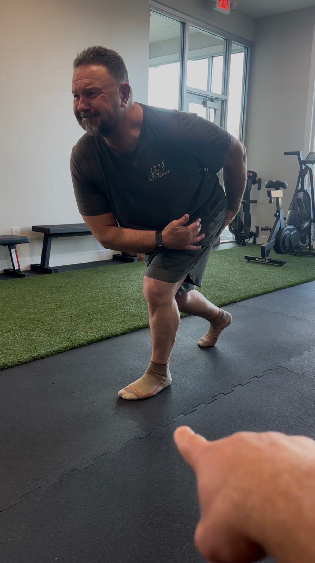 Mike Dianda performing a kickstand hinge for hip strengthening and mobility at MVMT Rx in Sparks NV