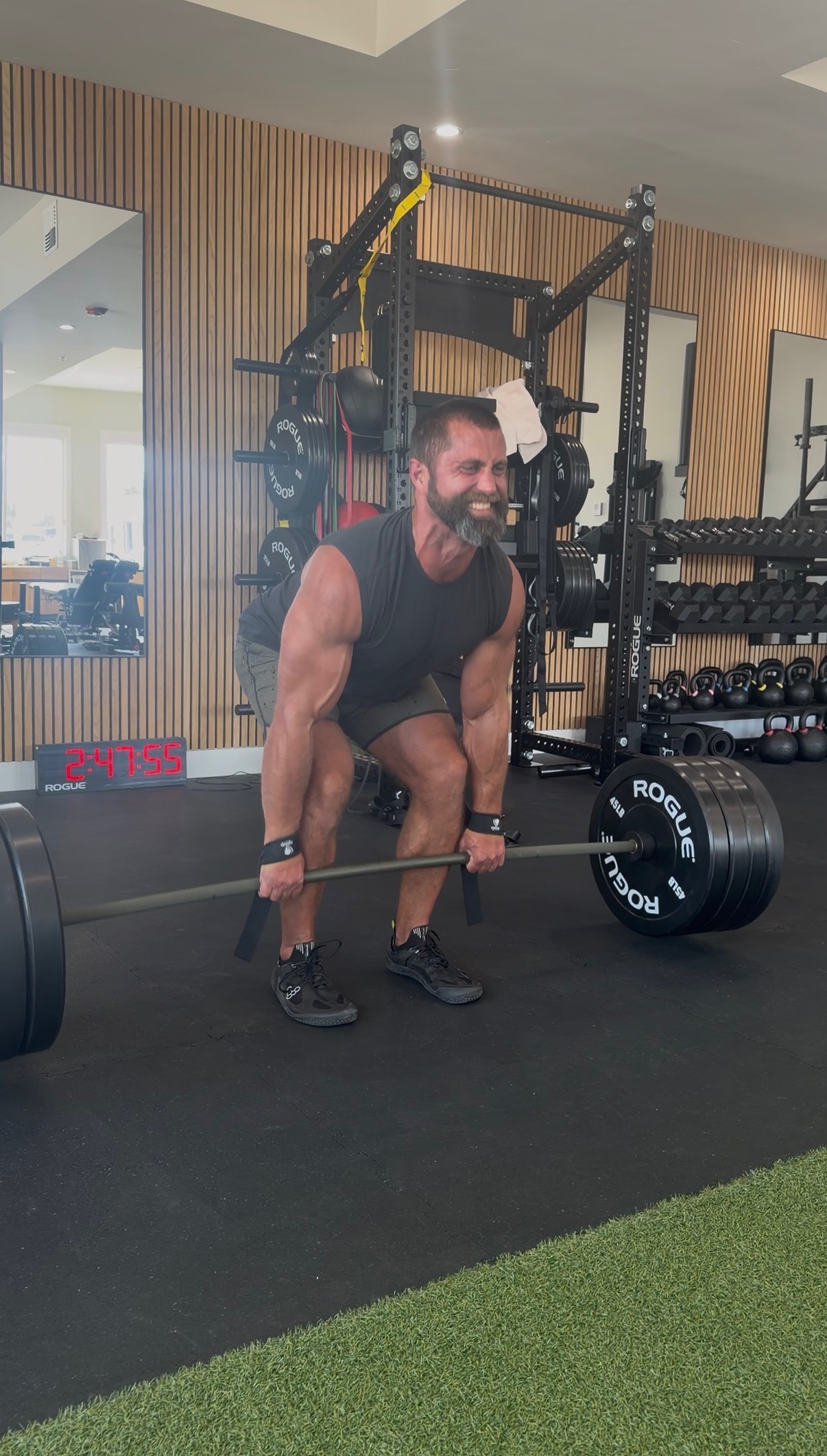Sports chiropractor Dr. Kyle Hemsley deadlifting 405 pounds after disc herniation rehab — progressive loading and return to lifting after herniated disc at MVMT Rx Reno Sparks NV