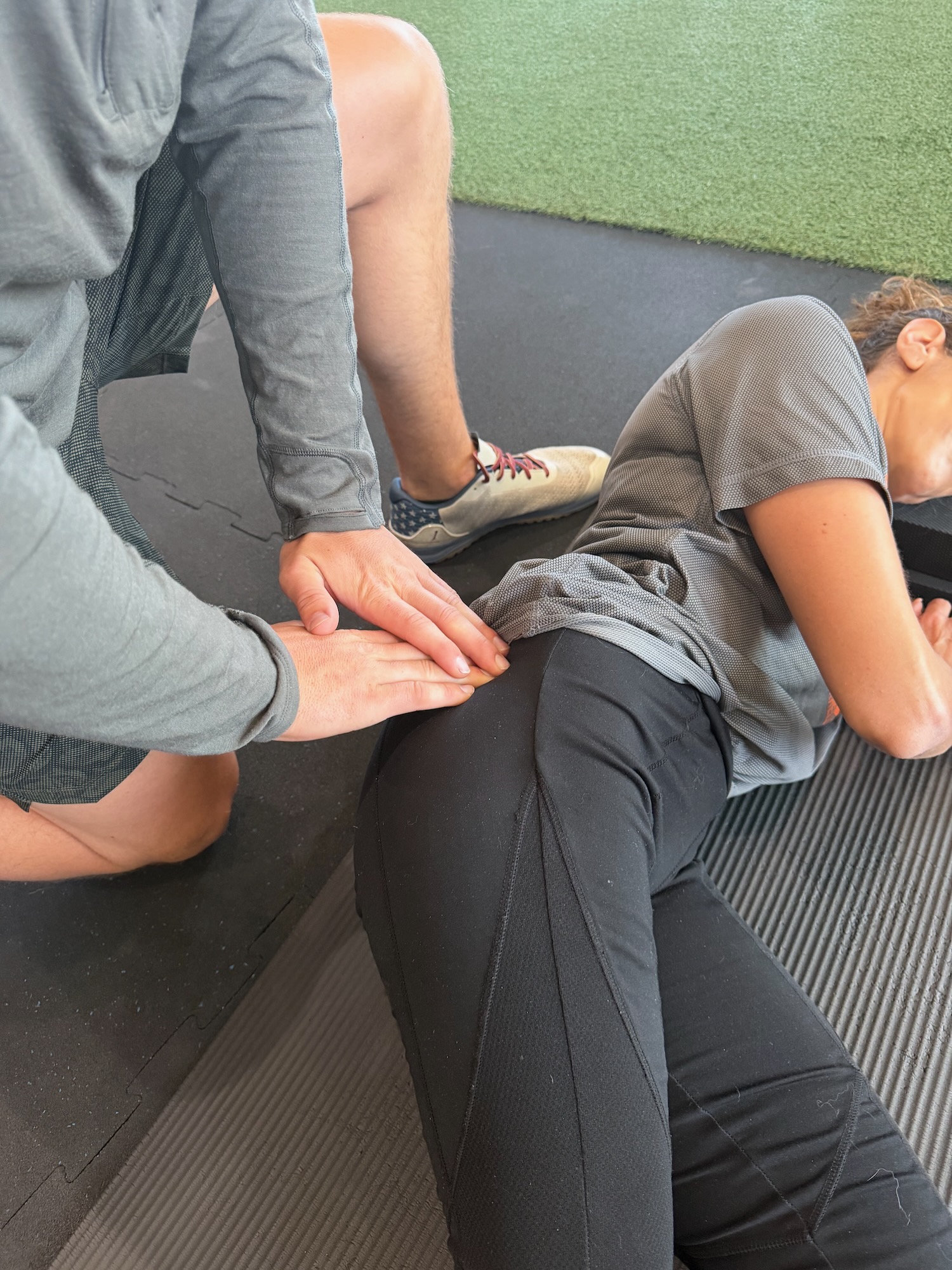 Palpating the greater trochanter to assess gluteal tendinopathy — lateral hip pain specialist Reno Sparks NV MVMT Rx