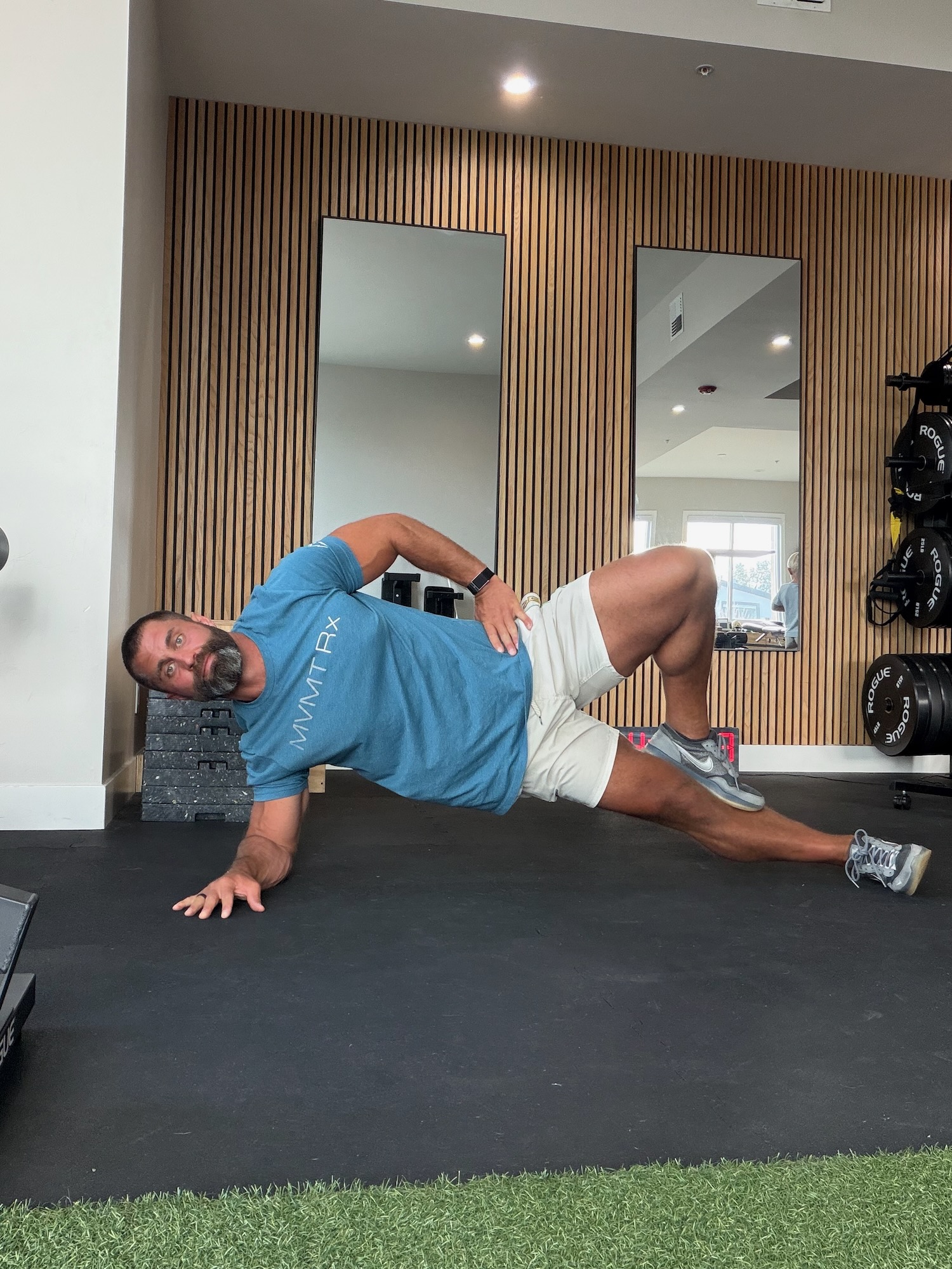Side plank glute squeeze self-test for gluteal tendinopathy — lateral hip pain assessment MVMT Rx Reno Sparks NV