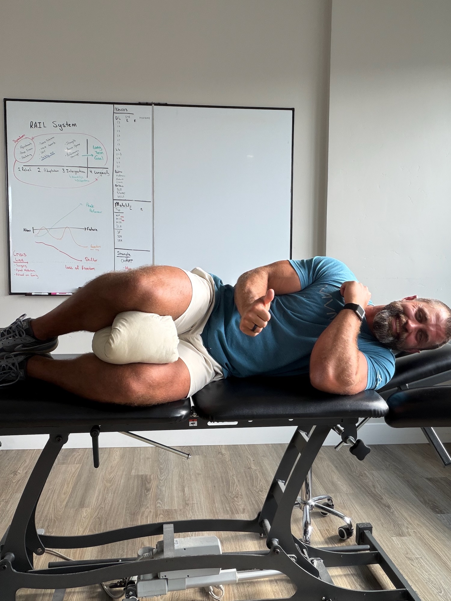 Pillow between the knees keeps the top leg from dropping across — side sleeping with gluteal tendinopathy, MVMT Rx Reno Sparks NV