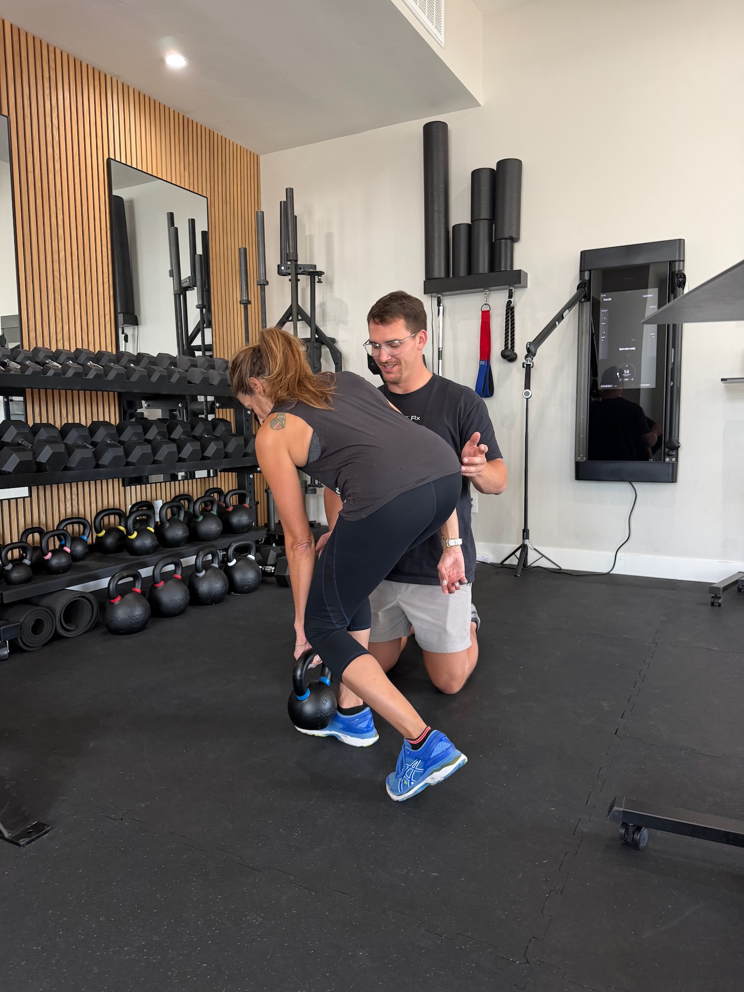 Coaching a loaded single-leg RDL for gluteal tendinopathy rehabilitation — progressive loading hip pain specialist Reno Sparks NV MVMT Rx