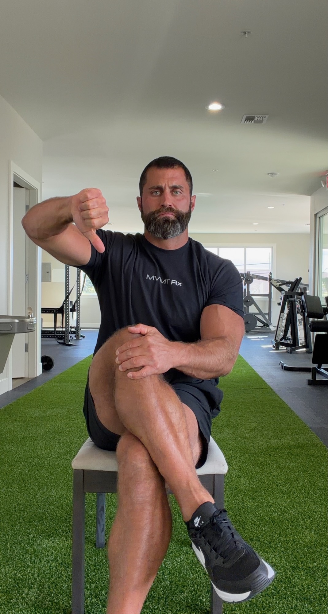 Sitting with legs crossed knee over knee compresses the gluteal tendon — posture to avoid with lateral hip pain, MVMT Rx Reno Sparks NV