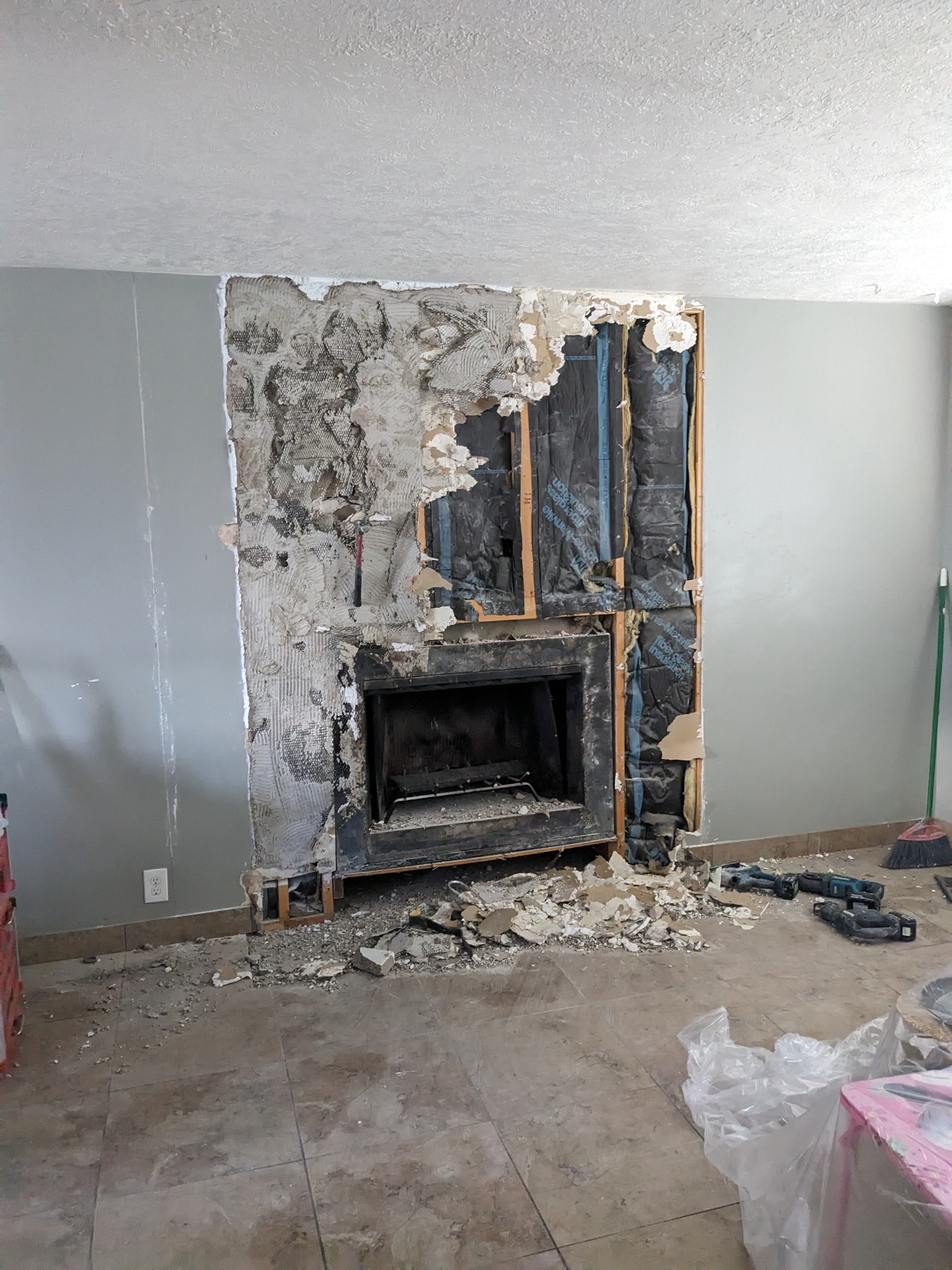Fireplace wall during demolition