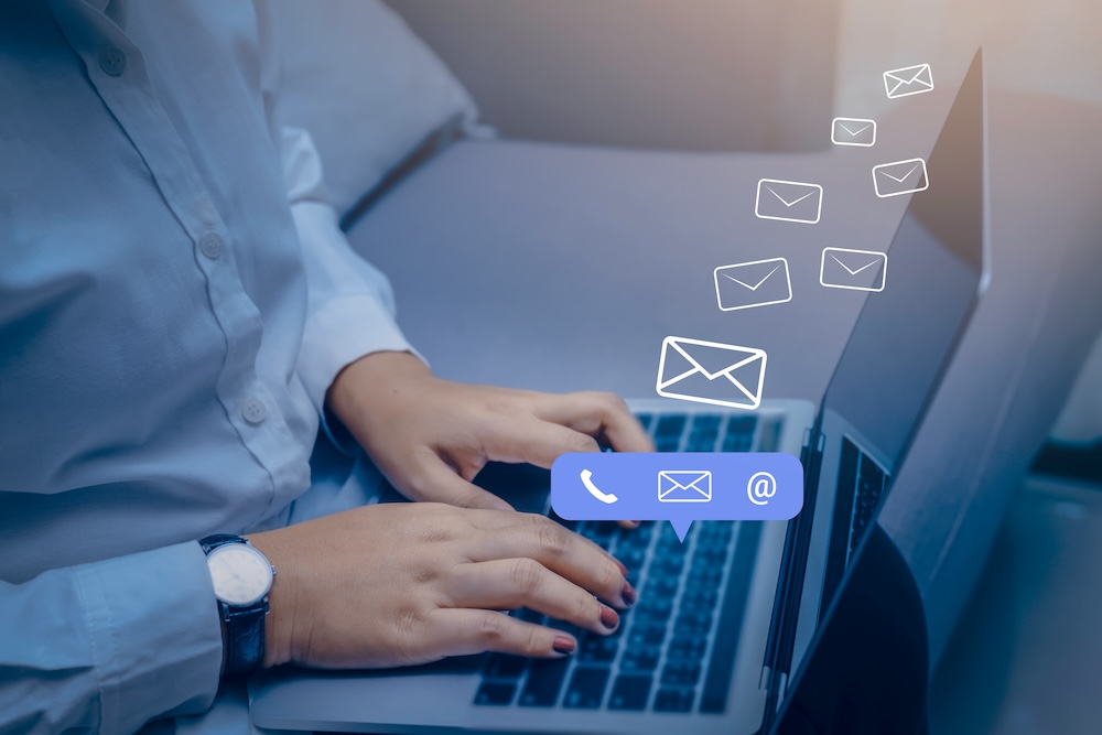 Person typing on a laptop, managing emails and communication, representing administrative services offered by Every Task for efficient business organization.