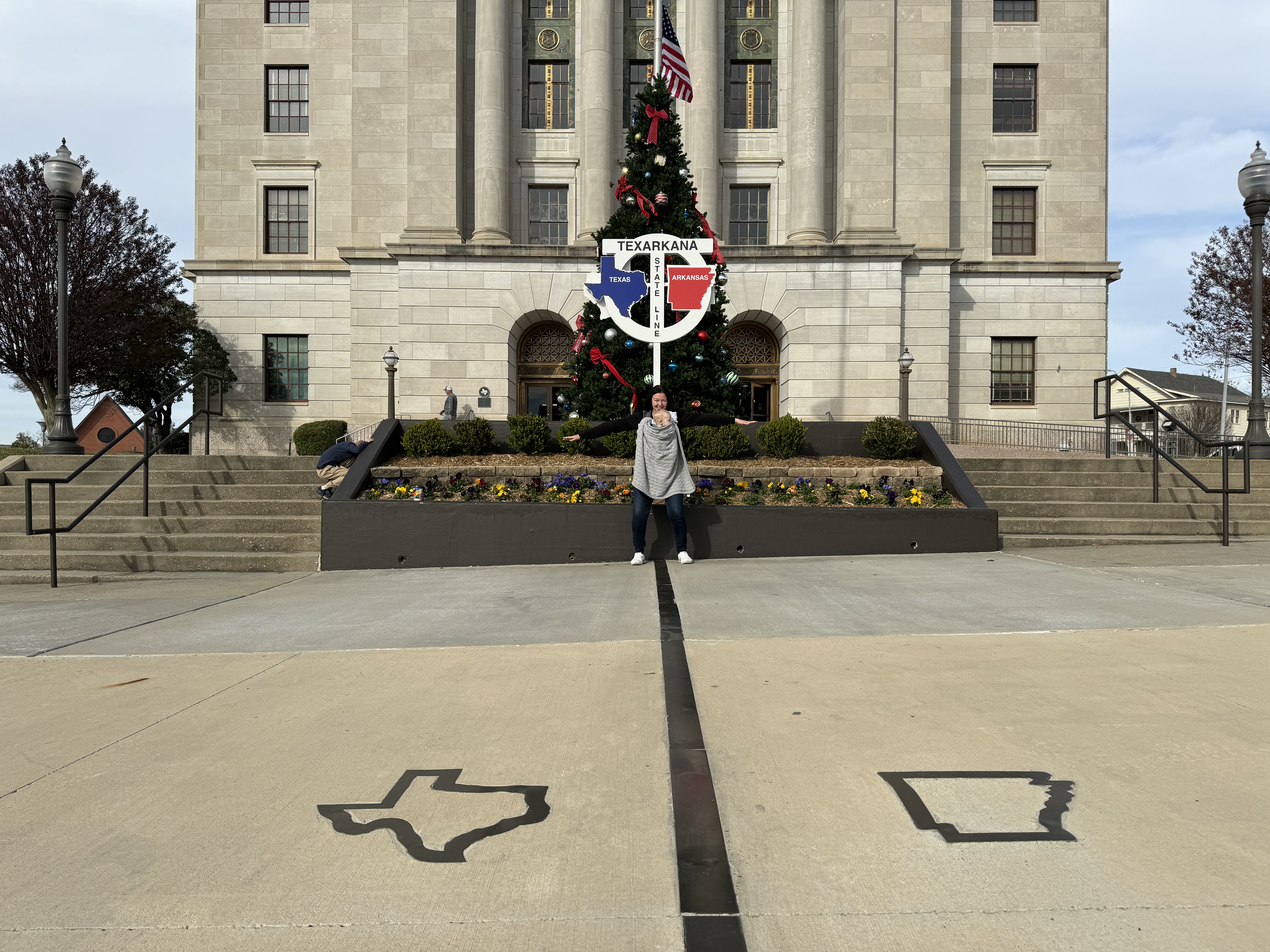 Texarkana state line. Joy Nicholson standing in the middle Texarkana state line. Joy Nicholson standing in the middle