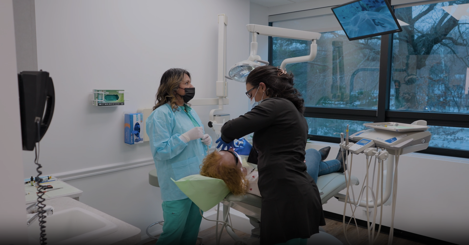 Group of dental team members smiling together representing friendly staff and welcoming clinic environment for patients