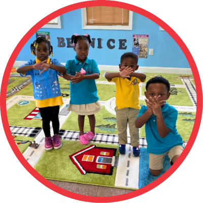 Four children learning and having fun in a stimulating environment at Toddler university Symrna