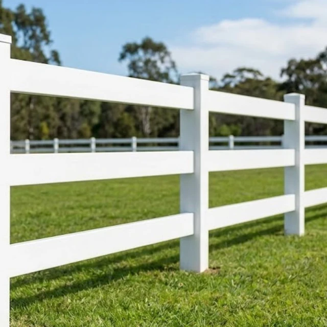 White PVC post and rail fencing