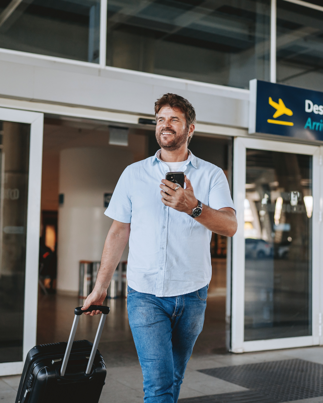 Driver welcoming arriving passengers at Sir Seewoosagur Ramgoolam International Airport in Mauritius