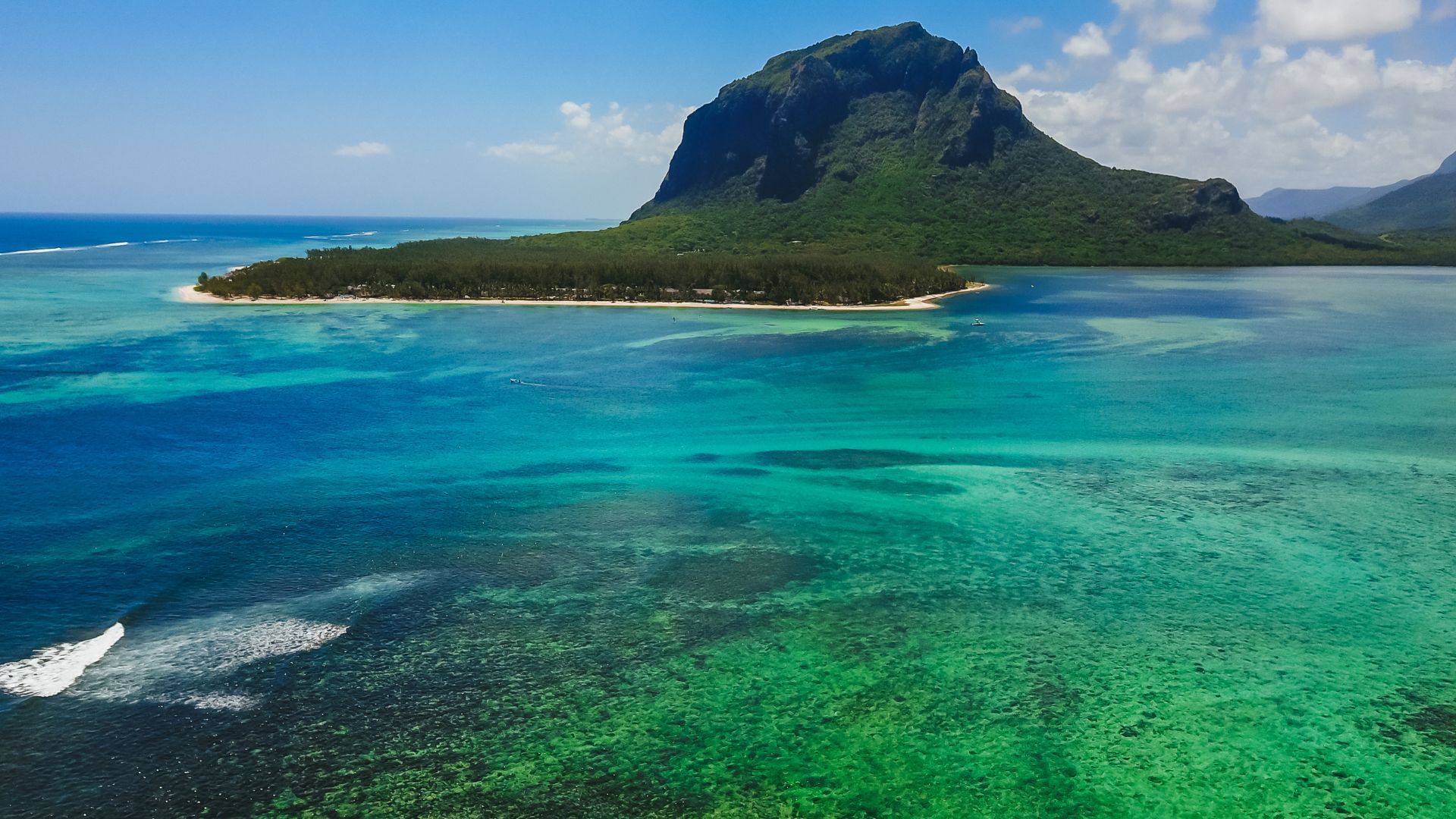 Scenic Mauritius coastal landscape with turquoise lagoon and palm trees