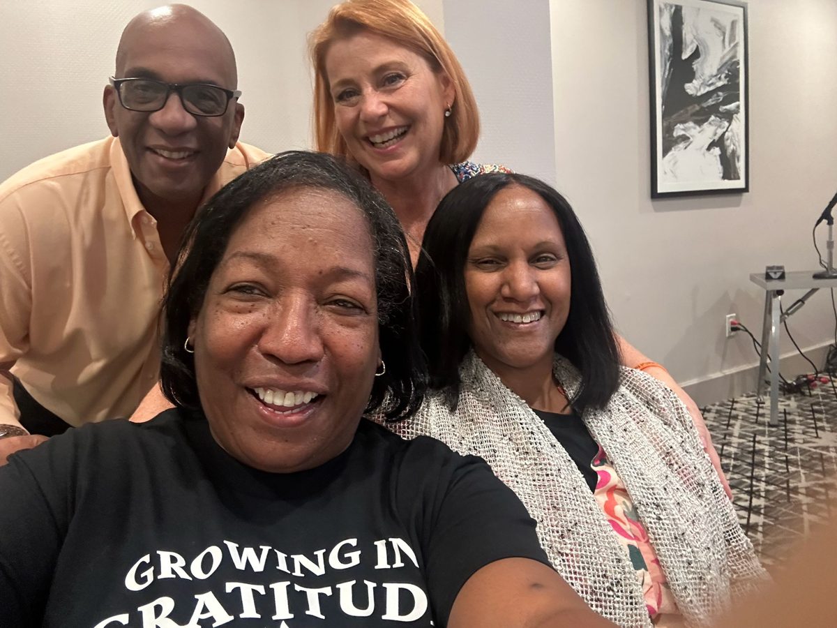 Friends wearing Growing in Gratitude shirts