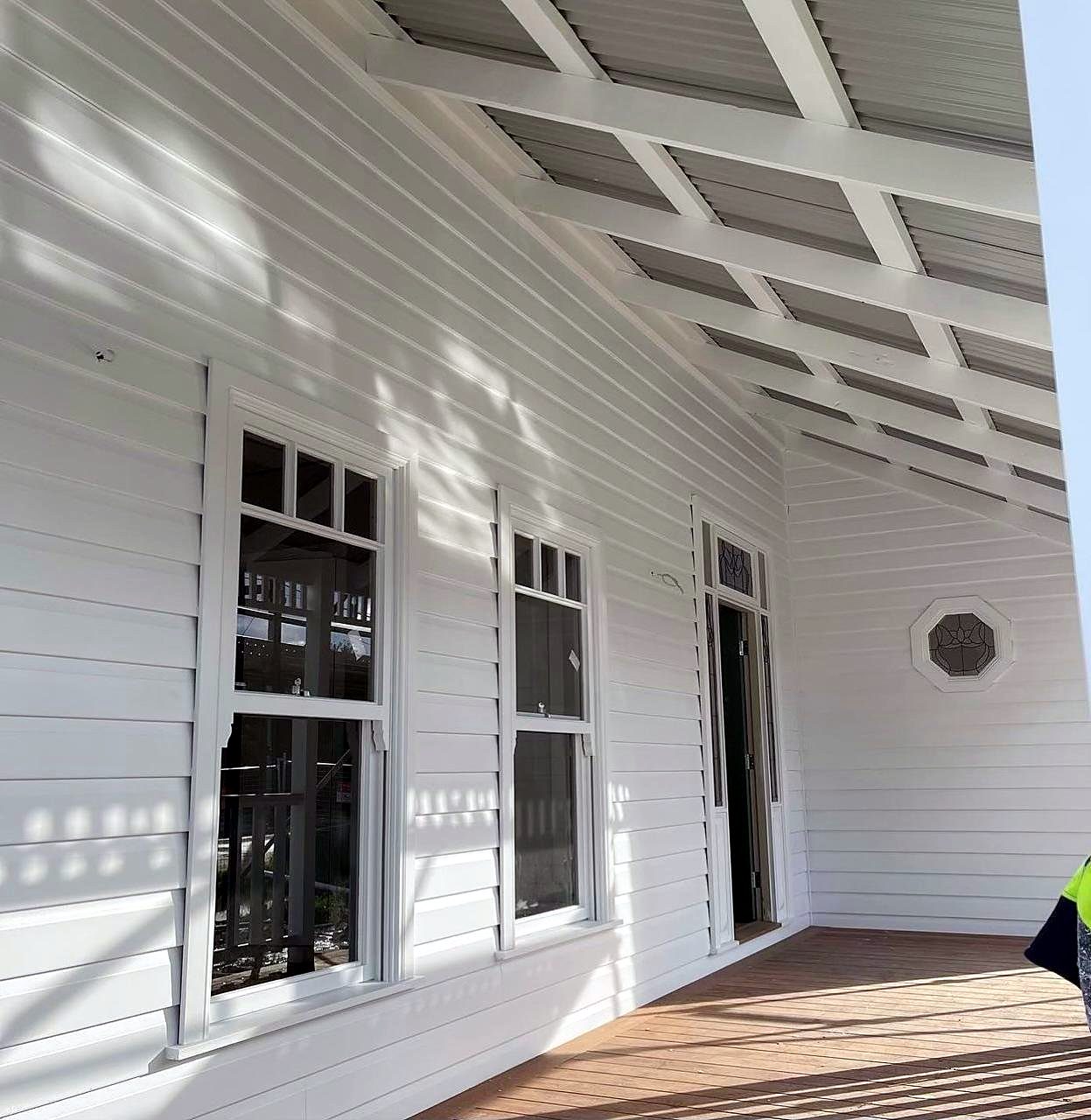 White weatherboard verandah freshly painted