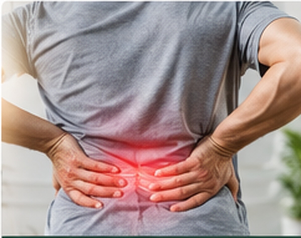 Person Holding Lower Back in Pain Highlighted with Red Light