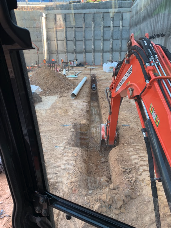 Drainage trench dug through backyard