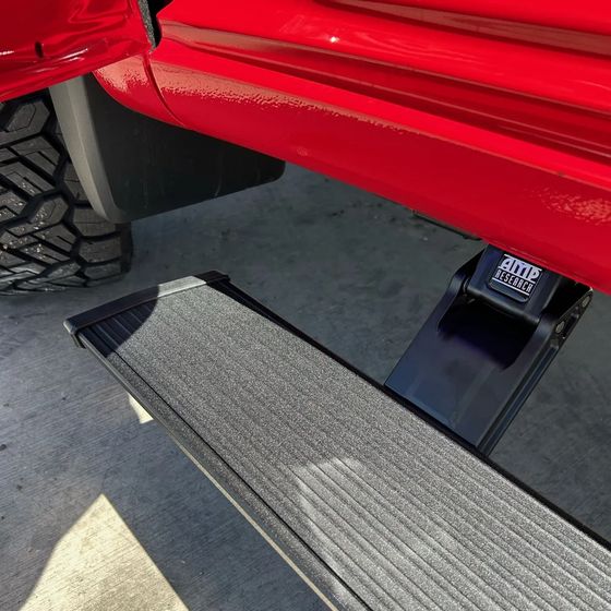 Power step under a truck.