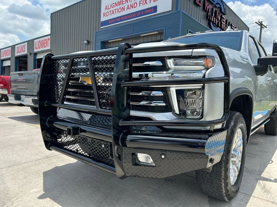 Chevrolet truck with a grille guard installed.