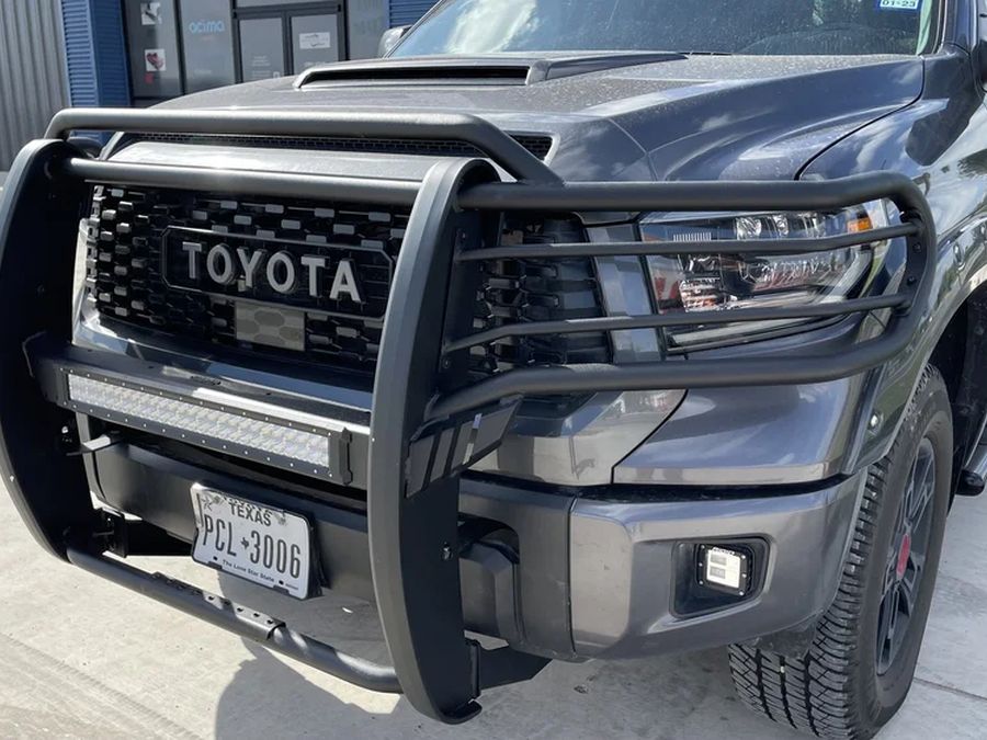 Toyota Tundra with a grille guard installed.