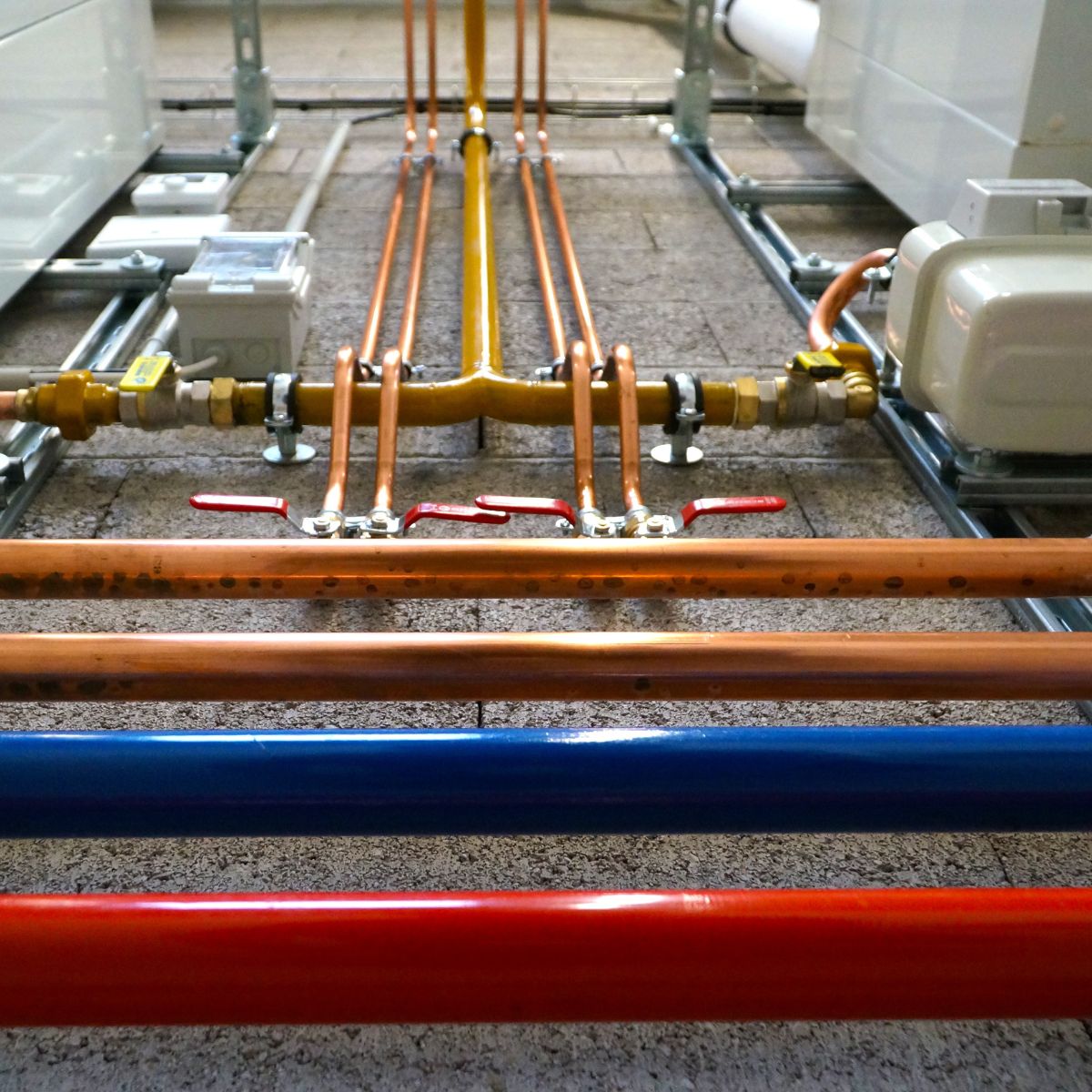 Commercial plumber working on commercial plumbing system in Phoenix