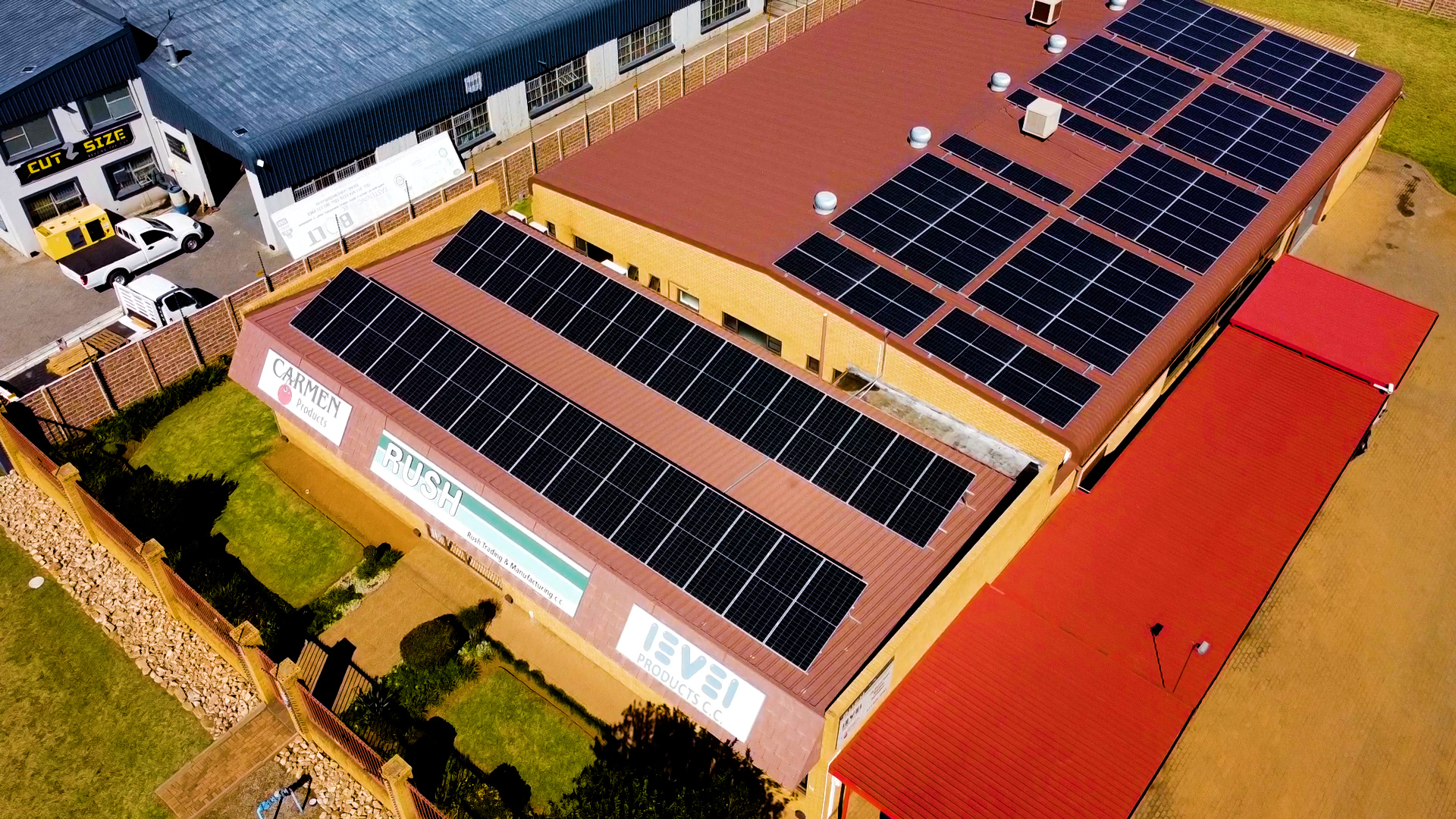 Solar panel installation on an industrial roof by Crown Technologies