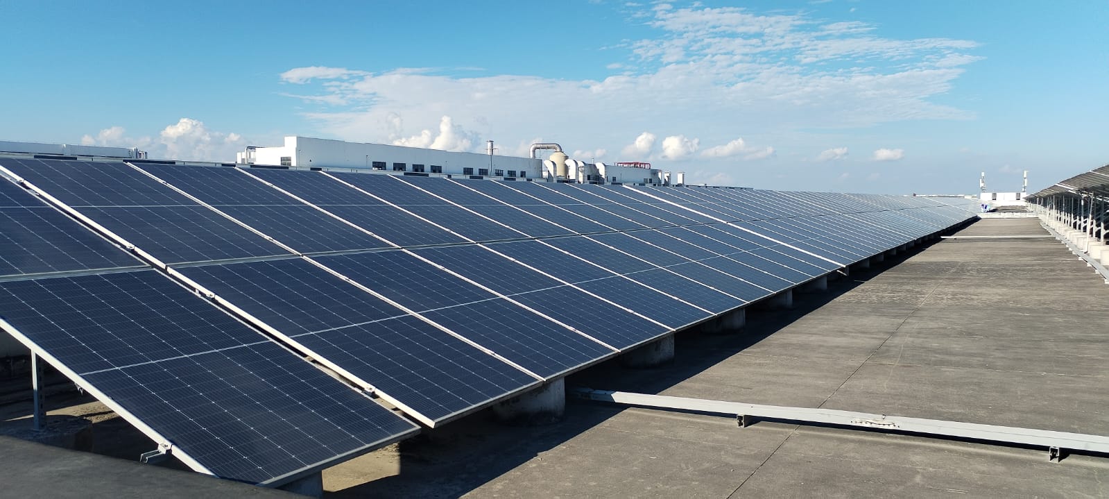 Commercial rooftop solar array installed by Crown Technologies