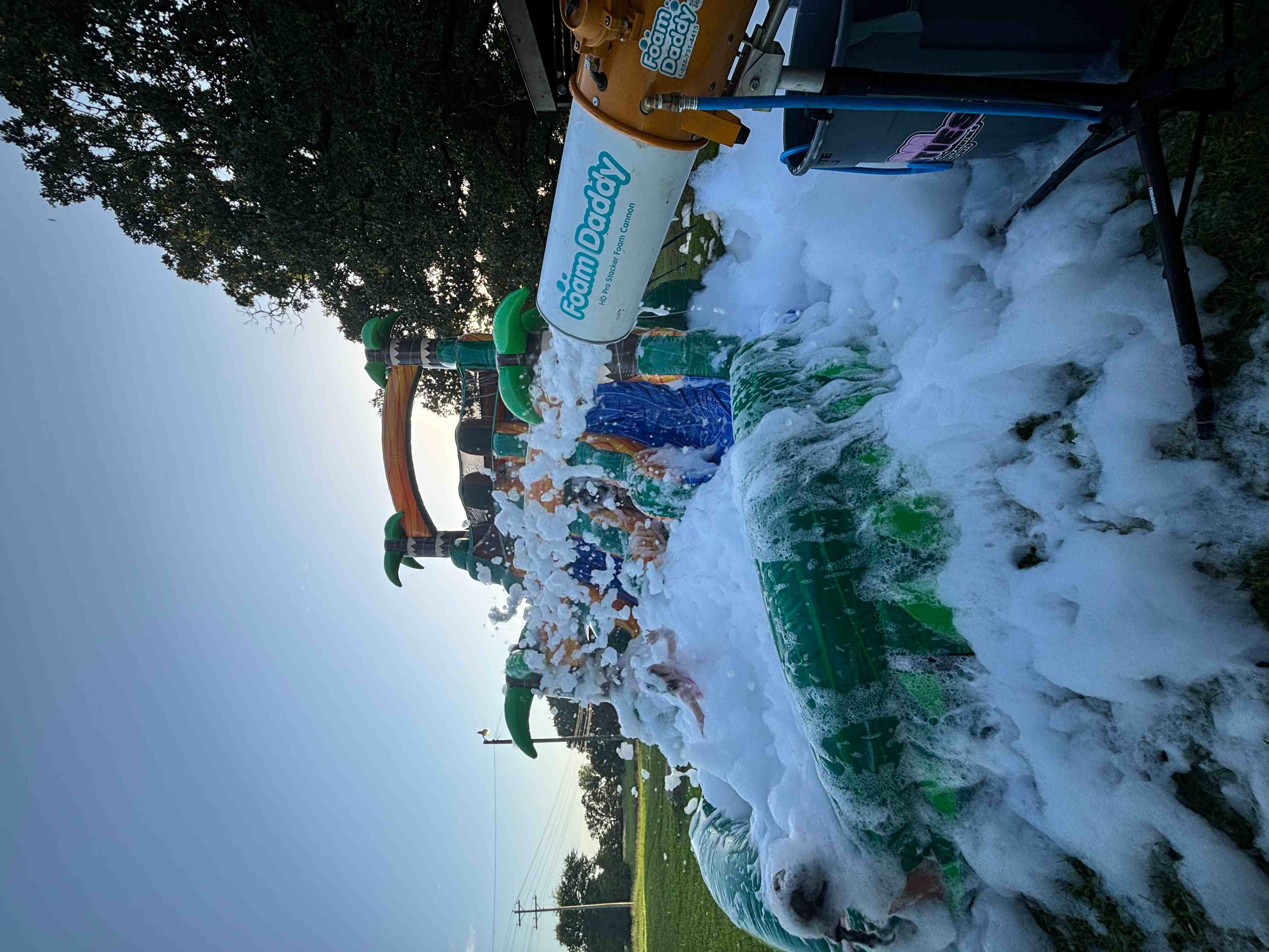 Foam party guests playing outdoors