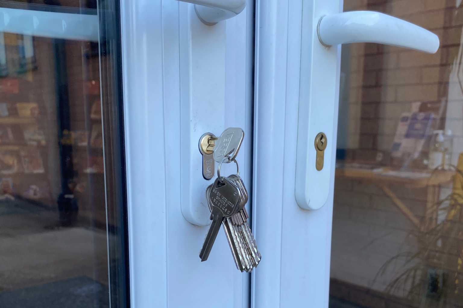 Emergency locksmith repairing uPVC door lock in St Helens