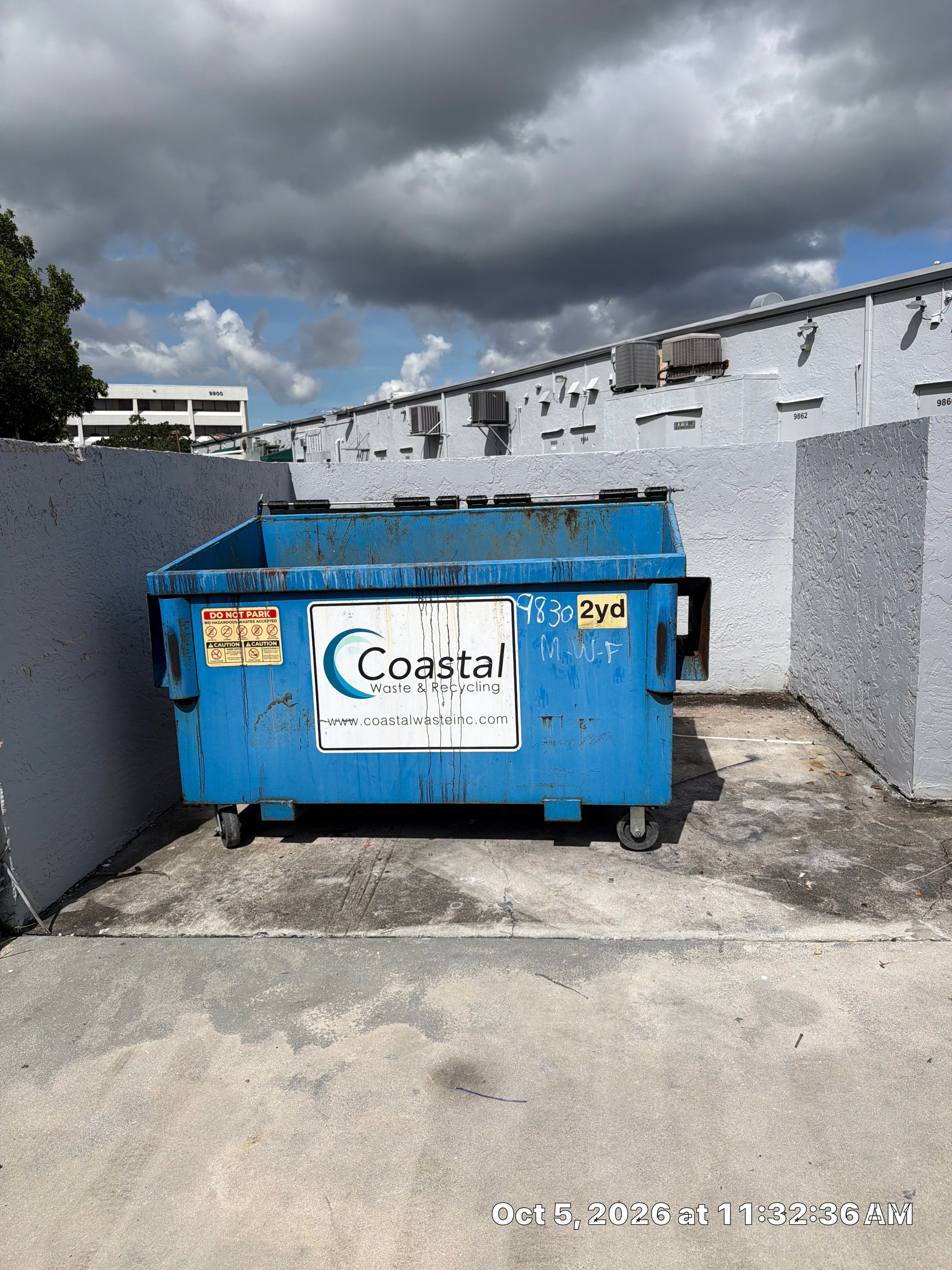 Commercial dumpster pad cleaning by BKB Pressure Cleaning