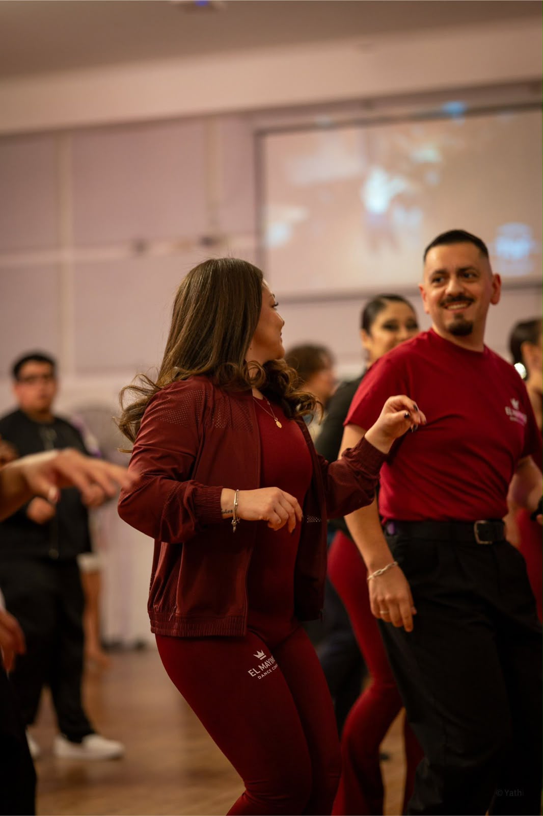 Teachers from El Mayimbe Dance Company dancing together in Toronto