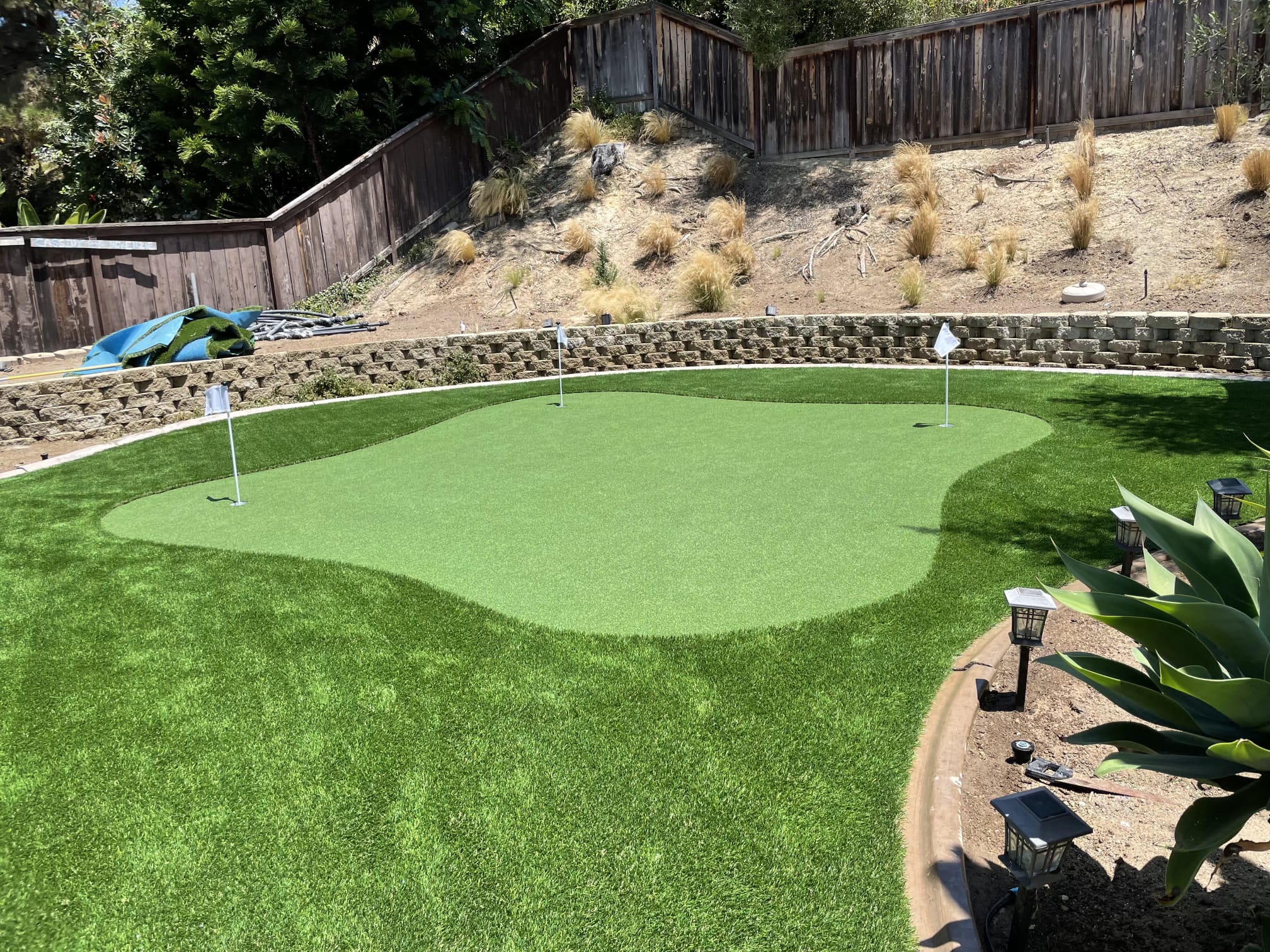 Large custom putting green with multiple cups