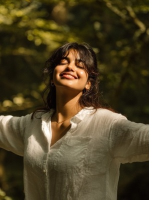 Woman standing outdoors feeling calm and grounded, symbolising the relief and emotional balance ADHD counselling can help build. Woman standing outdoors feeling calm and grounded, symbolising the relief and emotional balance ADHD counselling can help build.