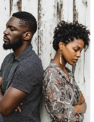 Couple standing back to back in emotional distance, representing unresolved anger, relationship tension, and the kind of conflict anger counselling can help address. Couple standing back to back in emotional distance, representing unresolved anger, relationship tension, and the kind of conflict anger counselling can help address.