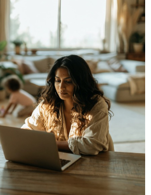 Woman working from home while grieving, highlighting exhaustion, emotional detachment, and managing daily responsibilities after loss. Woman working from home while grieving, highlighting exhaustion, emotional detachment, and managing daily responsibilities after loss.