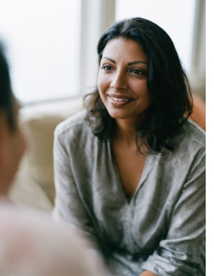 Woman speaking with a counsellor during an individual counselling session focused on emotional wellbeing Woman speaking with a counsellor during an individual counselling session focused on emotional wellbeing